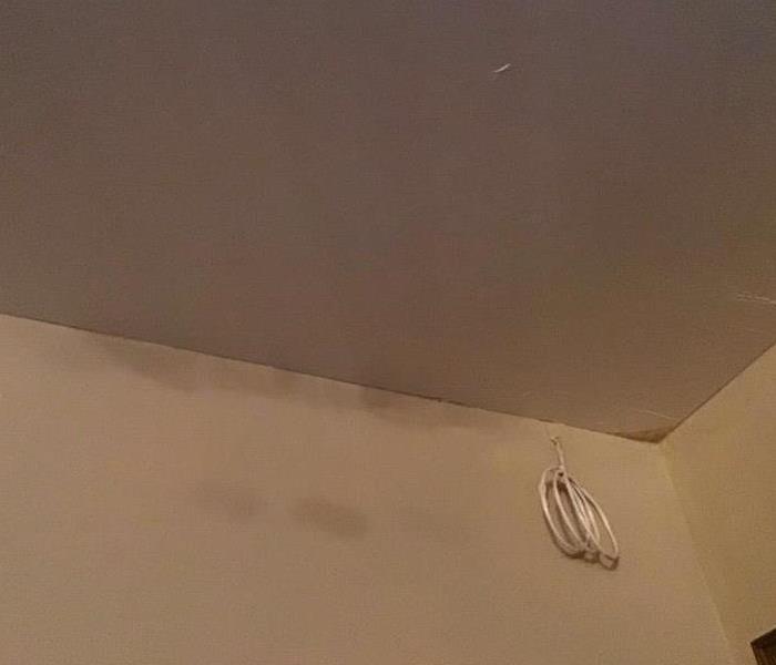 Water leaking through the ceiling. 